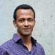 This image shows Dr. Bekele Teklemariam